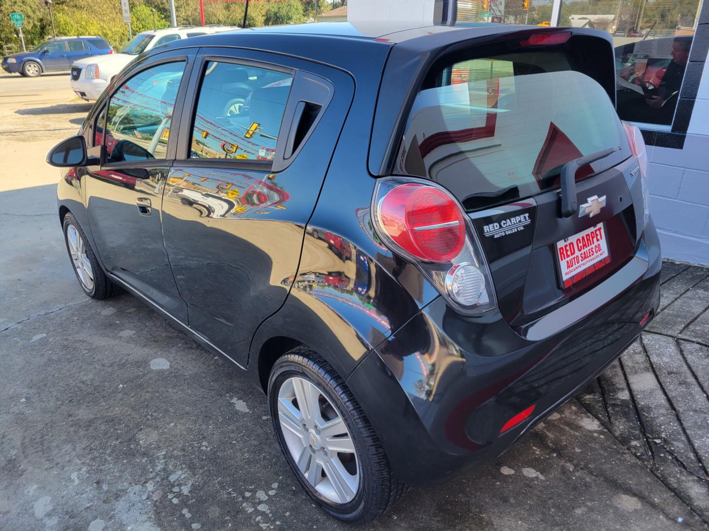 2015 BLACK Chevrolet Spark LS CVT (KL8CB6S98FC) with an 1.2L L4 16V DOHC engine, Continuously Variable Transmission transmission, located at 503 West Court, Seguin, TX, 78155, (830) 379-3373, 29.568621, -97.969803 - 2015 Chevrolet Spark LS CVT with a 1.2L L4 16V DOHC, Automatic, Tilt, AM/FM/AUX Stereo, Power Windows and Locks, Onstar Capability, Alloys Wheels, Rear Wiper, Rear Defroster and more!! - Photo#3